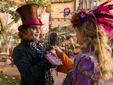 Johnny Depp and Mia Wasikowska star in "Alice Through The Looking Glass."