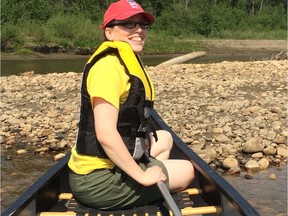 Jenny Gerbrandt, seen canoeing last year on the Clearwater River, doesn't know when she will return to her home in Fort McMurray following the massive wildfire there. On Tuesday, however, she will be in Saskatoon for her convocation from the University of Saskatchewan with a Master of Arts in environmental anthropology.