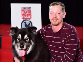 Mitch Hawman's heroic dog, Rex, seen in a handout photo, was inducted today into the 2016 Purina Animal Hall of Fame for waking a family member in time to escape a house fire.