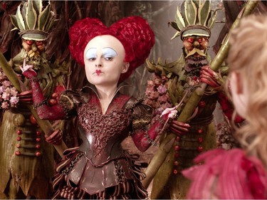 Helena Bonham Carter (L) and Mia Wasikowska star in "Alice Through The Looking Glass."