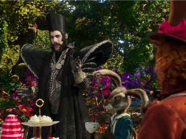 Sacha Baron Cohen (L) and Johnny Depp star in "Alice Through The Looking Glass."