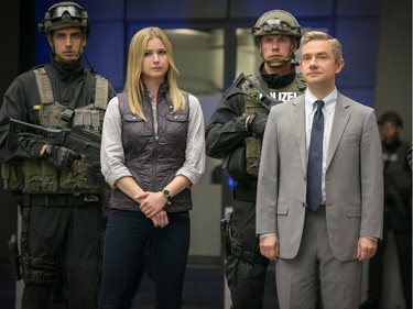 Emily VanCamp as Agent 13/Sharon Carter (2L) and Martin Freeman as Everett K. Ross (2R) in "Captain America: Civil War."
