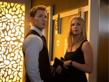 Chris Evans as Captain America/Steve Rogers and Emily VanCamp as Agent 13/Sharon Carter in "Captain America: Civil War."