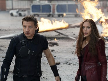 Jeremy Renner as Hawkeye/Clint Barton and Elizabeth Olsen as Wanda Maximoff/Scarlet Witch in "Captain America: Civil War."