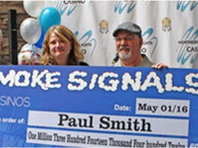 Paul Smith (right) of Saskatoon won more than $1.3 million on the Smoke Signals slot machine in Prince Albert. (supplied photo/SIGA)