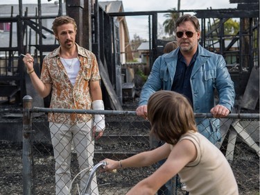 Ryan Gosling (L) and Russell Crowe star in "The Nice Guys."