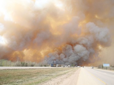 Residents of Fort McMurray flee southbound on Highway 63 on May 3, 2016. Wildfires forced the evacuation of the city Tuesday as high temperatures and winds continued to batter the region.