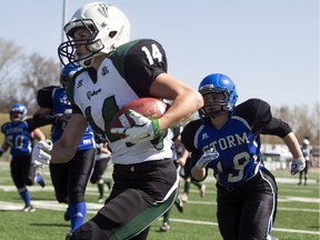 Saskatoon Valkyries running back Julene Friesen moves the ball against the Edmonton Storm during a Western Women's Canadian Football League (WWCFL) exhibition game at SMF field on Saturday, April 30, 2016.