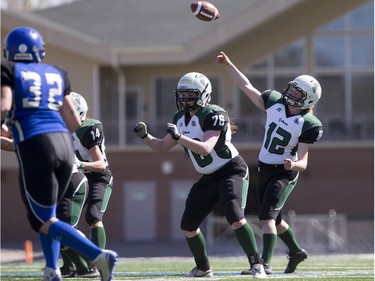 Saskatoon Valkyries quarterback Reed Thorstad throws a pass against the Edmonton Storm during a Western Women's Canadian Football League (WWCFL) exhibition game at SMF field, April 30, 2016.