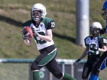 Saskatoon Valkyries receiver Alyssa Wiebe grabs a pass for a touchdown against the Edmonton Storm during a Western Women's Canadian Football League (WWCFL) exhibition game at SMF field on Saturday, April 30, 2016.