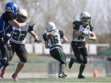 Saskatoon Valkyries running back Julene Friesen moves the ball against the Edmonton Storm during a Western Women's Canadian Football League (WWCFL) exhibition game at SMF field on Saturday, April 30, 2016