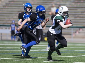 File Photo. Saskatoon Valkyries receiver Alyssa Weibe moves the ball against the Edmonton Storm during a Western Women's Canadian Football League (WWCFL) exhibition game at SMF field on Saturday, April 30, 2016