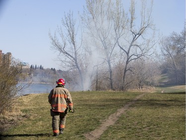 Saskatoon Firefighters respond to multiple fires along the Meewasin Trail between the University and Broadway Bridges, April 30, 2016.