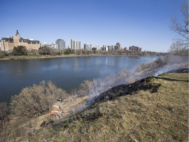 Saskatoon Firefighters respond to multiple fires along the Meewasin Trail between the University and Broadway Bridges, April 30, 2016.