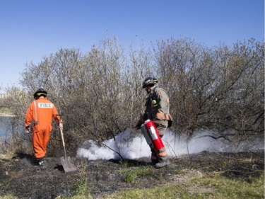 Saskatoon Firefighters respond to multiple fires along the Meewasin Trail between the University and Broadway Bridges, April 30, 2016.