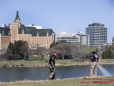 Saskatoon Firefighters respond to multiple fires along the Meewasin Trail between the University and Broadway Bridges, April 30, 2016.