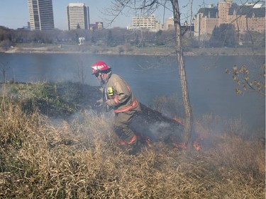 Saskatoon Firefighters respond to multiple fires along the Meewasin Trail between the University and Broadway Bridges, April 30, 2016.