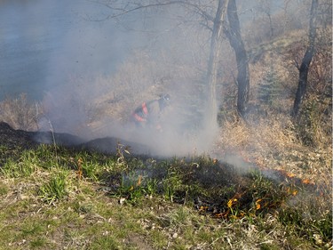 Saskatoon Firefighters respond to multiple fires along the Meewasin Trail between the University and Broadway Bridges, April 30, 2016.