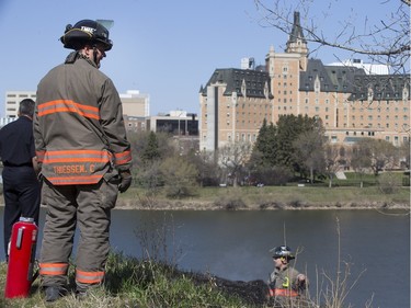 Saskatoon Firefighters respond to multiple fires along the Meewasin Trail between the University and Broadway Bridges, April 30, 2016.