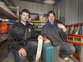 Arlen Hall, left, and Evan Demers recently moved their electrical contracting business, Age of Electric, into a new shop on First Avenue North.