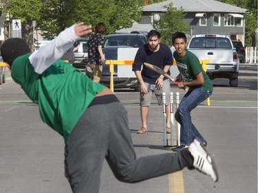 A well attended festival atmosphere at City Hall's Civic Square, where refugees and the Open Door Society took on the task of raising money for Fort McMurray with a game of cricket on 23rd Street East, May 16, 2016. Ethnic foods, song, music and art were part of the festivities.