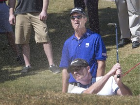 PGA Tour coach and short-game specialist James Sieckmann conducts a golf clinic at the Saskatoon Willows Golf and Country Club, helping golfers with their short game in the practice bunker. (GORD WALDNER/Saskatoon StarPhoenix)