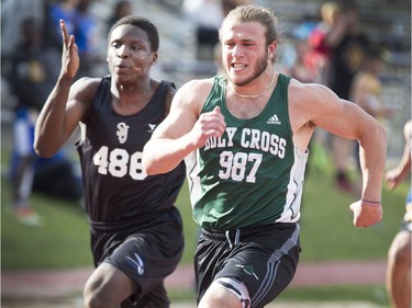 It's a close finish with Holy Cross Crusaders' Josh Ewanchyna edging out St. Joseph Guardians' Emmanual Akintunde in the senior boys 400-metre heat at the Saskatoon High School Track and Field city championships at Griffith Stadium, May 25, 2016.