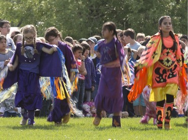 A sunny day enhances the beauty and colour bringing many cultures together at the 24th annual Mount Royal Collegiate Powwow, May 26, 2016.