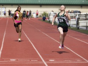 Lauren Weisgerber finished first in her 100-metre sprint heat a few strides ahead of her competitors at the Saskatoon High School Track and Field Championships at Griffiths Stadium, May 26, 2016.