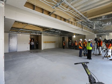 Special Projects Manager for the City of Saskatoon, Jeanna South with Gregory Burke, Remai Modern executive Director and CEO gave the media a tour of the gallery with the building contract at the 90% complete stage, May 6, 2016.