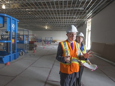 Special Projects Manager for the City of Saskatoon, Jeanna South with Gregory Burke, Remai Modern executive director and CEO gave the media a tour of the gallery with the building contract at the 90 per cent complete stage, May 6, 2016.