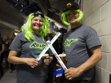 Karen Worme (left) and Brad Spence from Regina attend at the Saskatoon Rush game at the SaskTel Centre in Saskatoon, Saskatchewan on Saturday, May 21st, 2016.