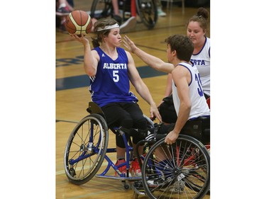 Alberta Black's #5 Ben Moronchukcompetes against Alberta Blue in the gold medal game at the 2016 Junior West Regional Wheelchair Basketball Championship at Walter Murray Collegiate on May 1, 2016.