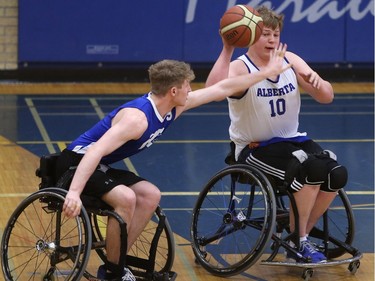 Alberta White's Brandon Doll competes against the BC Storm in the bronze medal game during the 2016 Junior West Regional Wheelchair Basketball Championship at Walter Murray Collegiate on May 1, 2016.