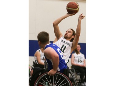 Saskatchewan Green's Jared Sajtos competes against BC Royals in the 2016 Junior West Regional Wheelchair Basketball Championship at Walter Murray Collegiate on May 1, 2016.