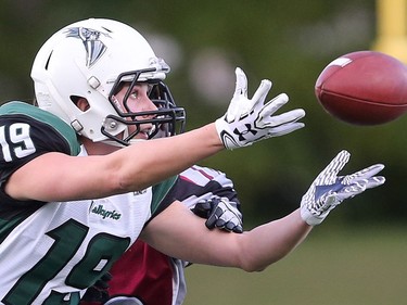 Saskatoon Valkyries' Marci Kiselyk makes a catch against the Regina Riot in women's tackle football action at SMF Field in Saskatoon on May 22, 2016.