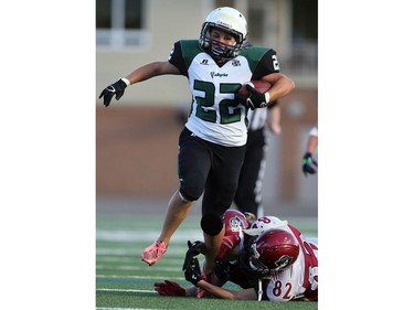 Saskatoon Valkyries' Samantha Matheson plays the Regina Riot in women's tackle football action at SMF Field in Saskatoon on May 22, 2016.