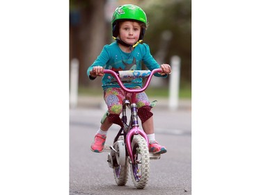 Young cyclist Tové Lawrence races at Bikes on Broadway in downtown Saskatoon on May 22, 2016.