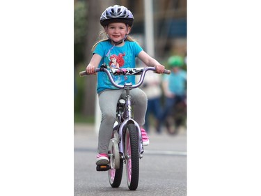 Young cyclist Zoey Coller races at Bikes on Broadway in downtown Saskatoon on May 22, 2016.