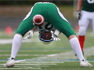 North's Carter Dahl snaps the ball during 6 Man Ed Henick Senior Bowl action at SMF Field in Saskatoon on May 23, 2016.