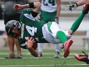 North's Ryan Krupski falls with the ball during 6 Man Ed Henick Senior Bowl action at SMF Field in Saskatoon on May 23, 2016.