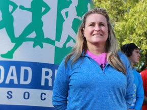 Boston Marathon bombing amputee victim Roseann Sdoia stands by the start line at the Saskatchewan Marathon at Deifenbaker Park in Saskatoon on May 29, 2016.