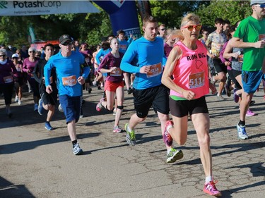 Judy Warick runs the 5km at the Saskatchewan Marathon at Deifenbaker Park in Saskatoon on May 29, 2016.