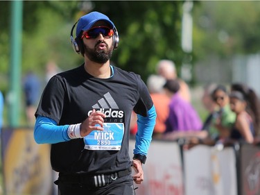 Mick J finishes the 10km at the Saskatchewan Marathon at Deifenbaker Park in Saskatoon on May 29, 2016.