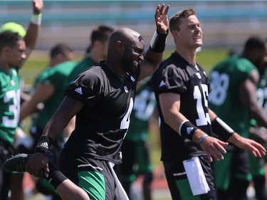 Quarterback Darian Durant stretches during day one of Riders training camp at Griffiths Stadium in Saskatoon, May 29, 2016.
