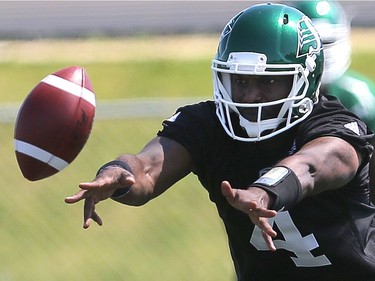 Quarterback Darian Durant stretches during day one of Riders training camp at Griffiths Stadium in Saskatoon, May 29, 2016.