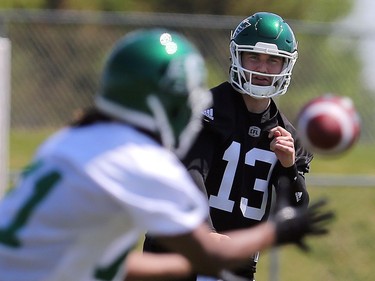 Quarterback Nick Bynkoski throws the ball during day one of Riders training camp at Griffiths Stadium in Saskatoon, May 29, 2016.