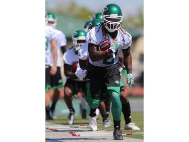 Running back Curtis Steele practices his foot work during day one of Riders training camp at Griffiths Stadium in Saskatoon, May 29, 2016.