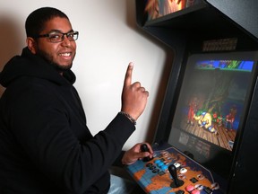 Norman Forrest, who is going to Toronto to compete in a national Street Fighter V competition plays the game on a restored arcade cabinet in his Saskatoon home on May 8, 2016.