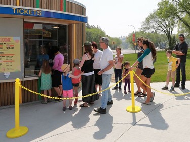 People line up for tickets on opening day at Kinsmen Park on May 8, 2016.